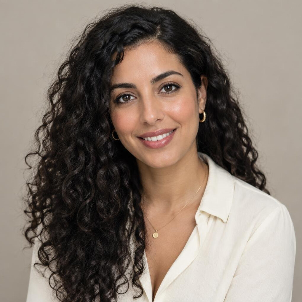 Portrait of a young woman with curly hair